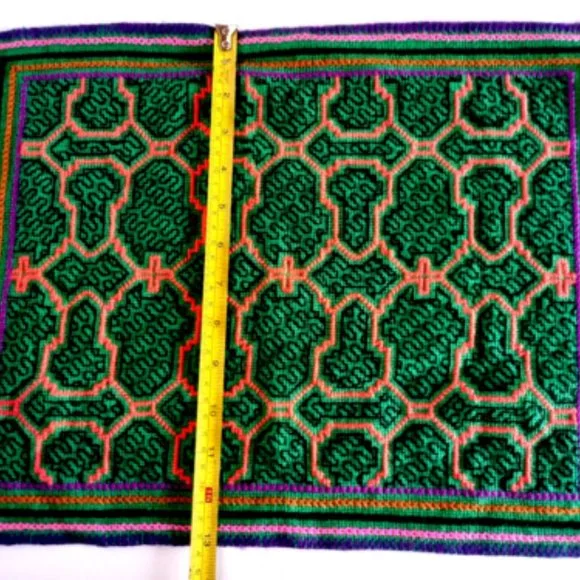 Hand embroidered shipibo altar design multicolored patterns Amazon jungle